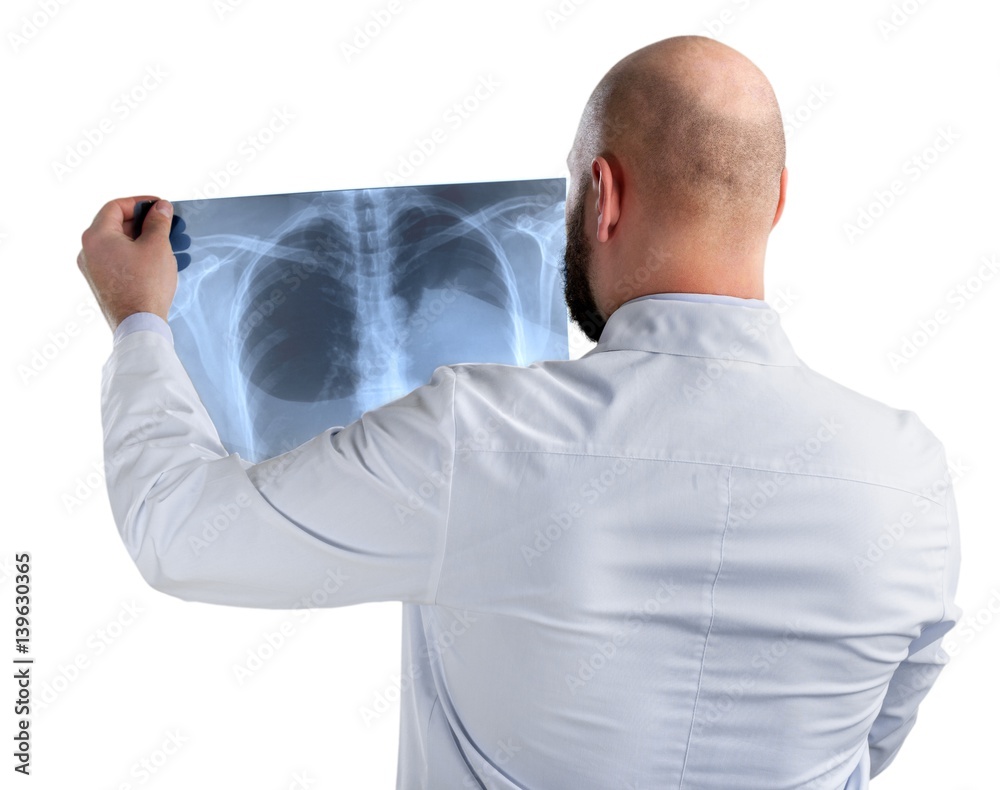 Doctor looking chest x-ray film. Stock Photo | Adobe Stock