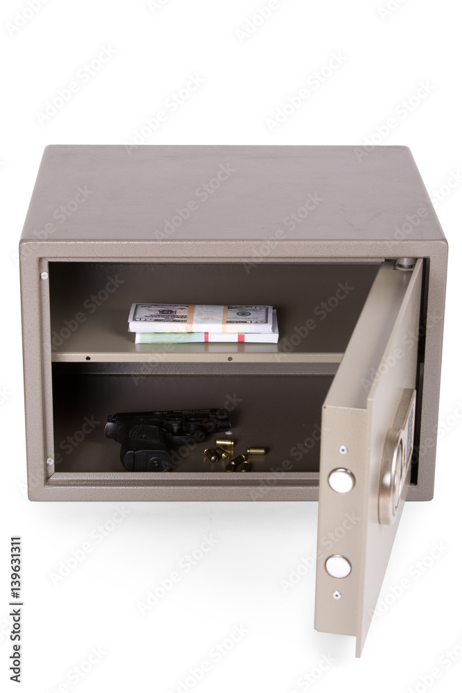 Safe with money and weapons against white background Safe with money and weapons against white background