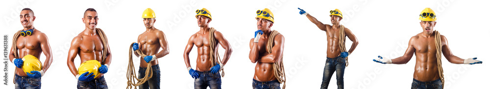 Muscular builder with tools isolated on white Muscular builder with tools isolated on white