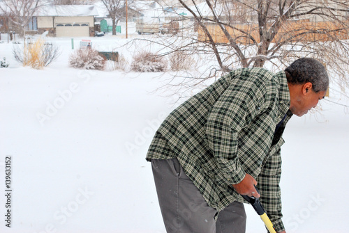 African american male in winter snow outside.