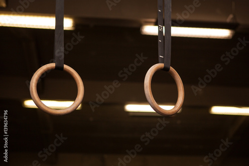 Gymnastic apparatus sport rings on black background