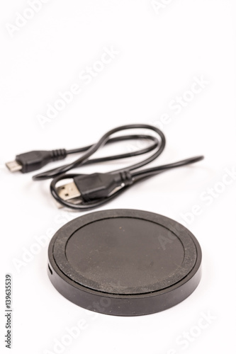 Wireless mobile charger isolated over white background