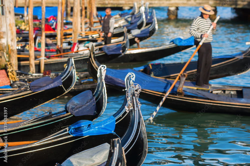 gondolas at a canal in Venice