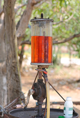 vintage (retro) old fuel dispenser in thailand photo