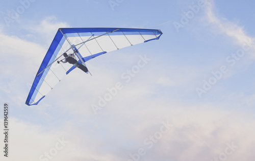Vintage photo of Hang Glider flying in the sky
