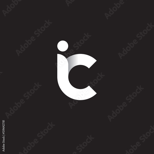 Initial lowercase letter ic, linked circle rounded logo with shadow gradient, white color on black background photo