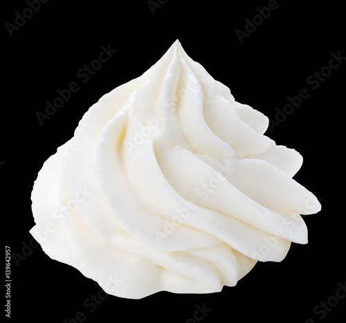 Whipped cream isolated on black background with clipping path.