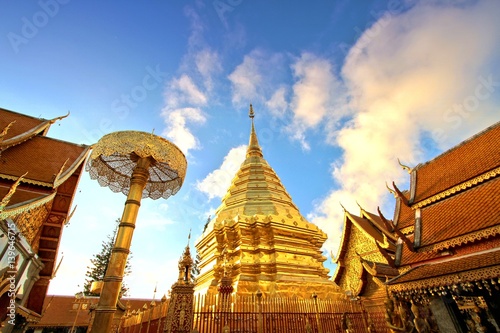 Golden pagoda against clear blue sky at Wat Phra That Doi Suthep, A famous Theravada buddhist temple at Chiang Mai, Thailand