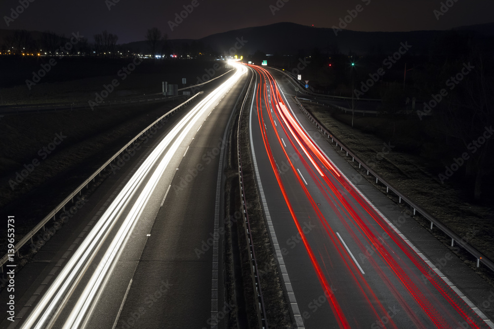 Highway by night with car lights trails, Slovakia Highway by night with car lights trails, Slovakia