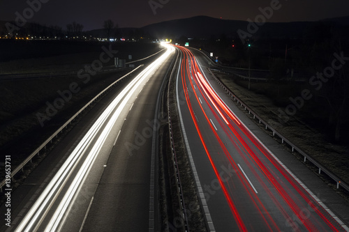 Highway by night with car lights trails, Slovakia