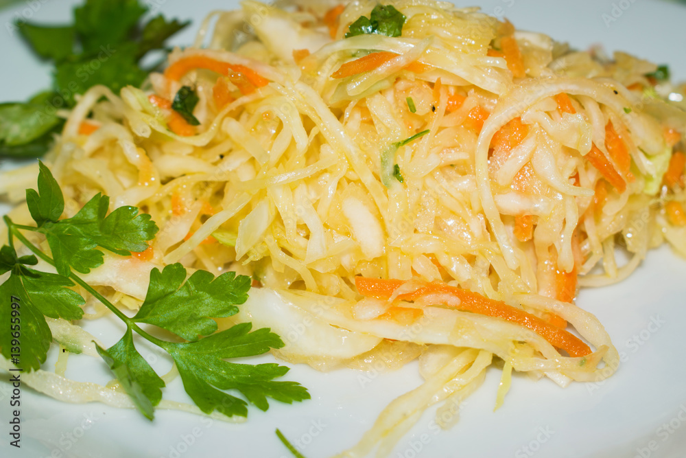 Chopped sauerkraut with carrot and parsley Chopped sauerkraut with carrot and parsley