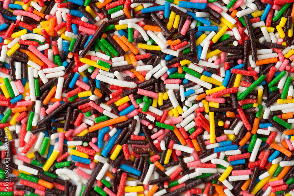 Sugar sprinkle dots, decoration for cake and bekery, a lot of sprinkles as a background Sugar sprinkle dots, decoration for cake and bekery, a lot of sprinkles as a background