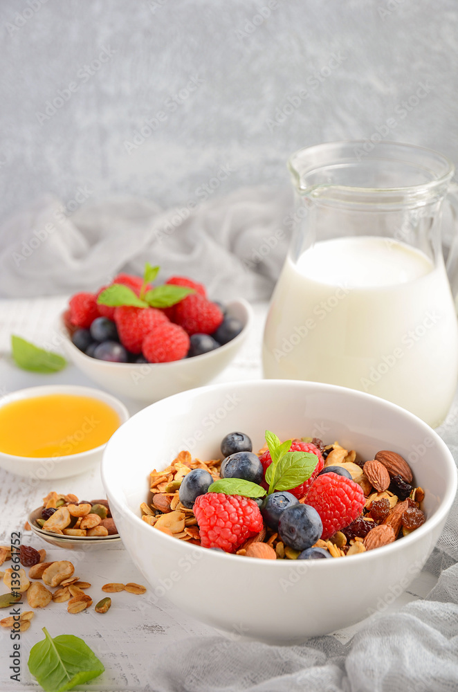 Homemade granola with fresh berries, selective focus, copy space Homemade granola with fresh berries, selective focus, copy space