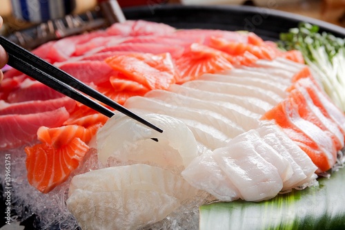 assorted sliced raw fish.