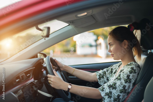 young woman happy in car © stcom