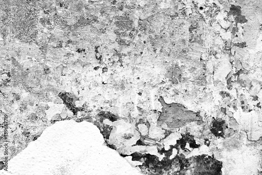 Fototapeta premium Wall fragment with scratches and cracks