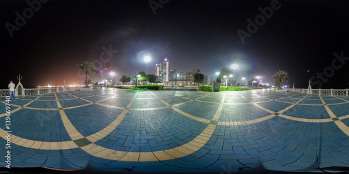  360 degrees spherical panorama of the abu dhabi (UAE) corniche at night with view of the skyline