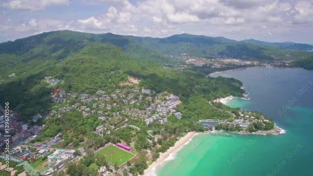 High Aerial Shot Overlooking Surin, Laem Singh and Kamala Beaches in Phuket Thailand
High Aerial Shot Overlooking Surin, Laem Singh and Kamala Beaches in Phuket Thailand