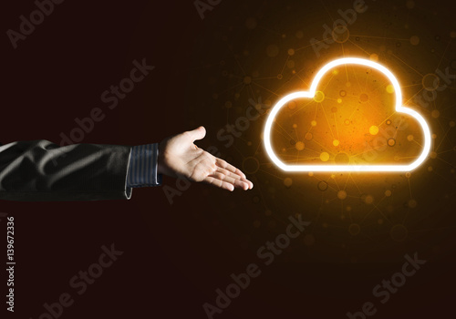 Fototapeta Naklejka Na Ścianę i Meble -  Digital cloud icon as symbol of wireless connection on dark background