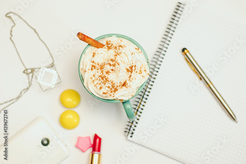 Blank empty notebook page with pen and spice latte . Spring summer flat lay with accessories