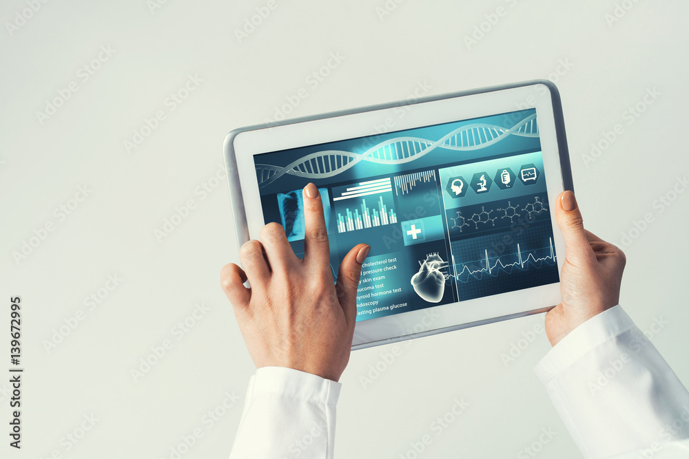 Close of female doctor hands working with tablet pc computer Close of female doctor hands working with tablet pc computer