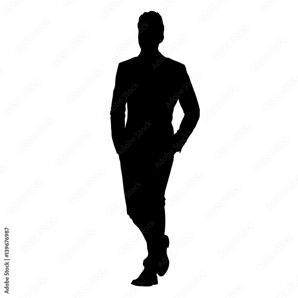 Young businessman in suit walking with hands in his pockets, vector silhouette