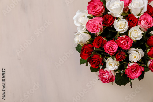 Bouquet of roses background. Wedding natural flowers. Valentines day or 8 march floral gift. Romantic love design.