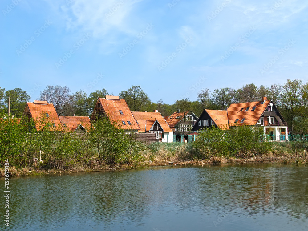 View of the cottage settlement on the bank of the lake. Kaliningrad region