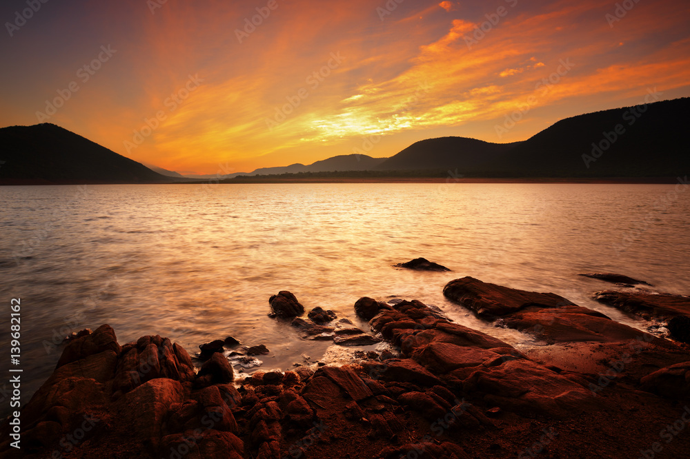 Fototapeta premium Sunrise at Loskopdam on a summers morning in South Africa