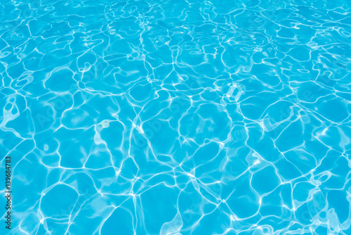 Blue water surface and ripple wave in pool