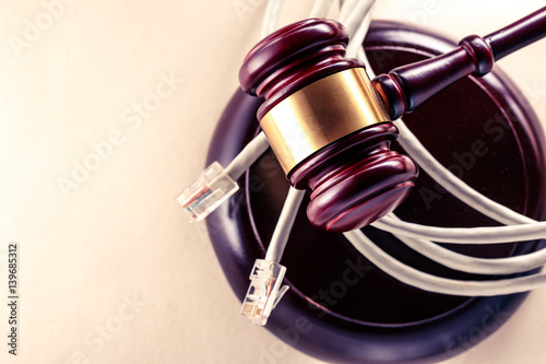 Computer cable and wooden gavel