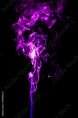 Purple smoke on a black background