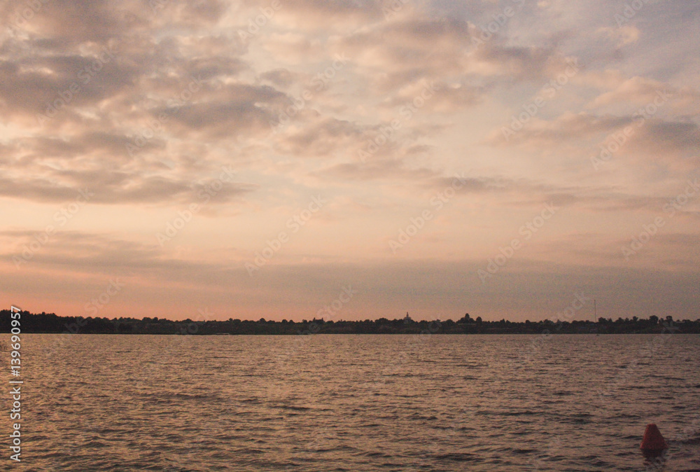 Buoy on a lake at dawn