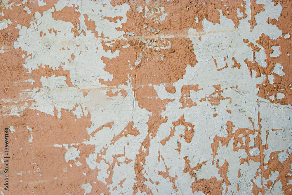 Weathered wall painted  in light brown color