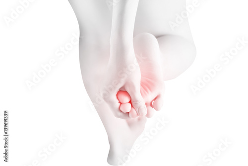 Acute pain in a woman feet isolated on white background. Clipping path on white background. © chatchai