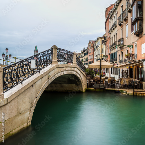 long time exposure of a typical venetian bridge over a canal, Venice, Italy, Europe © AR Pictures