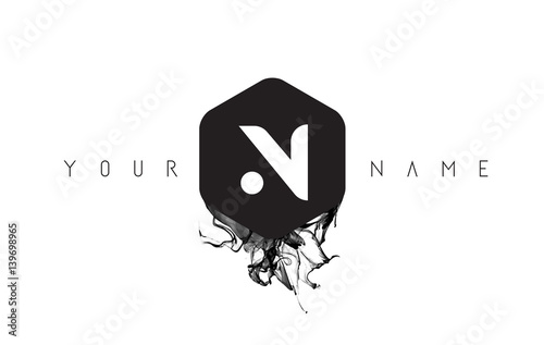 N Letter Logo Design with Black Ink Spill photo