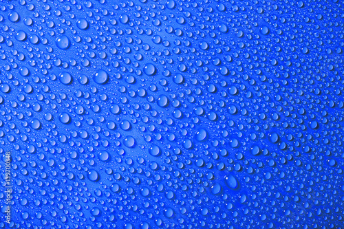 Water drops on the blue background