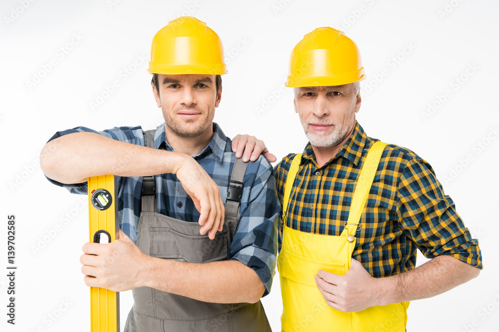 Workmen with level tool Workmen with level tool