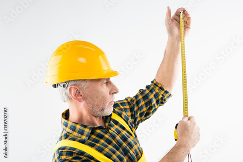 Mature workman in hard hat