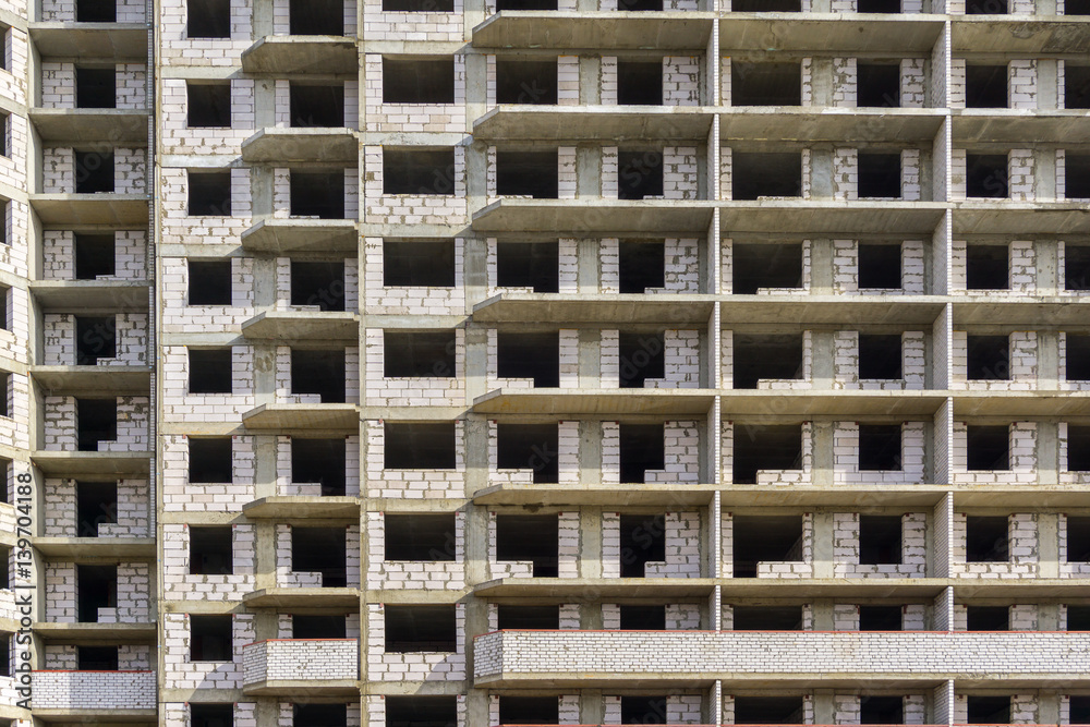 Facade wall of construction cite concrete building, pattern or background