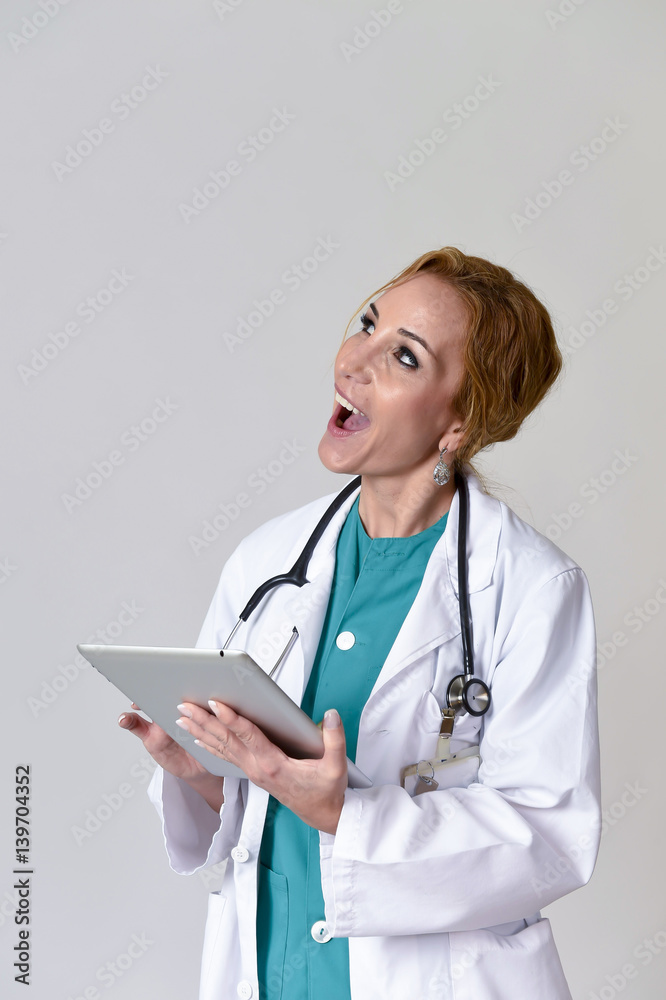 happy woman md emergency doctor or nurse posing smiling using di happy woman md emergency doctor or nurse posing smiling using di