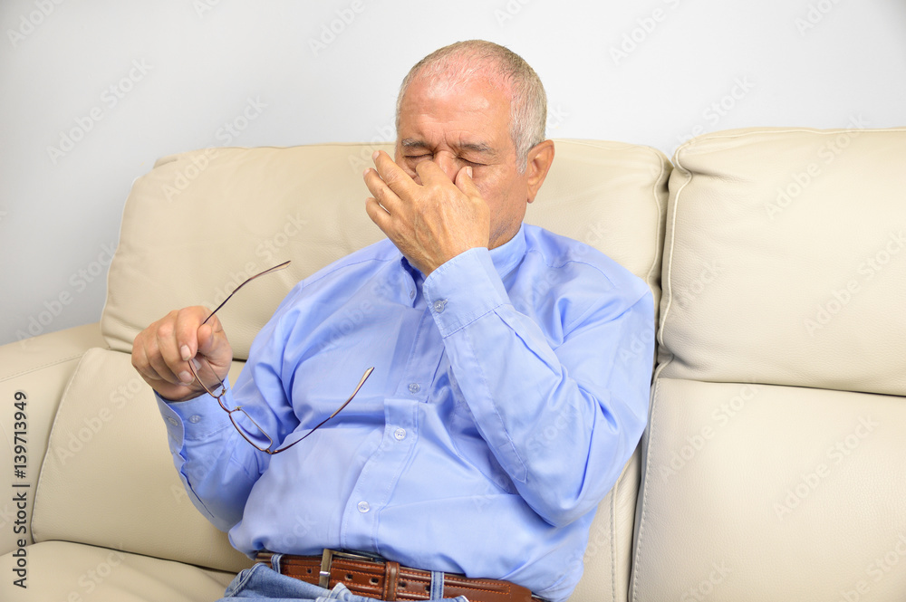Senior man looking stressed Senior man looking stressed