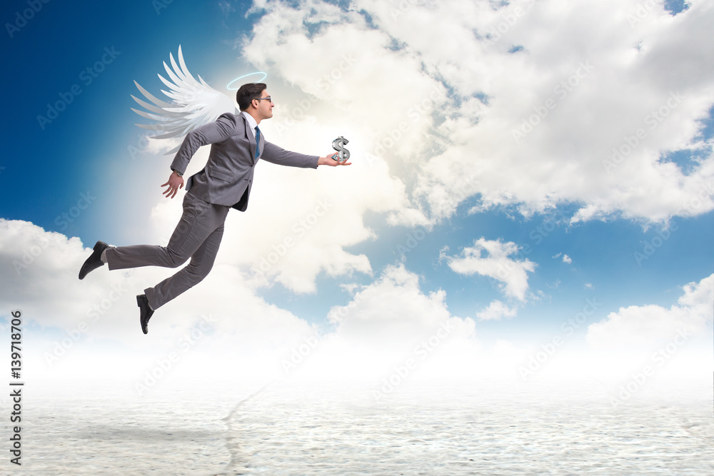 Angel investor concept with businessman with wings Angel investor concept with businessman with wings