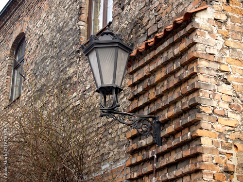 Decorative lamp on a wall of an old building in Gdansk, Poland