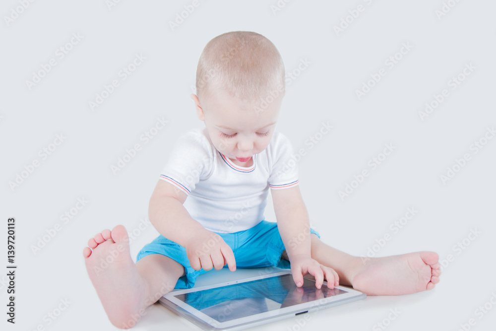 one year old baby interested in tablet one year old baby interested in tablet