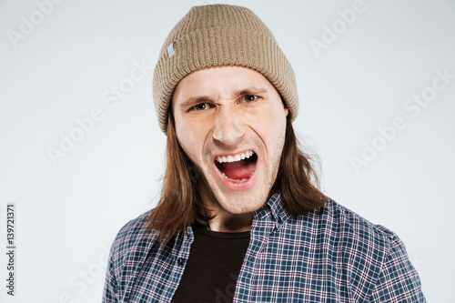 Close up portrait of Screaming hipster