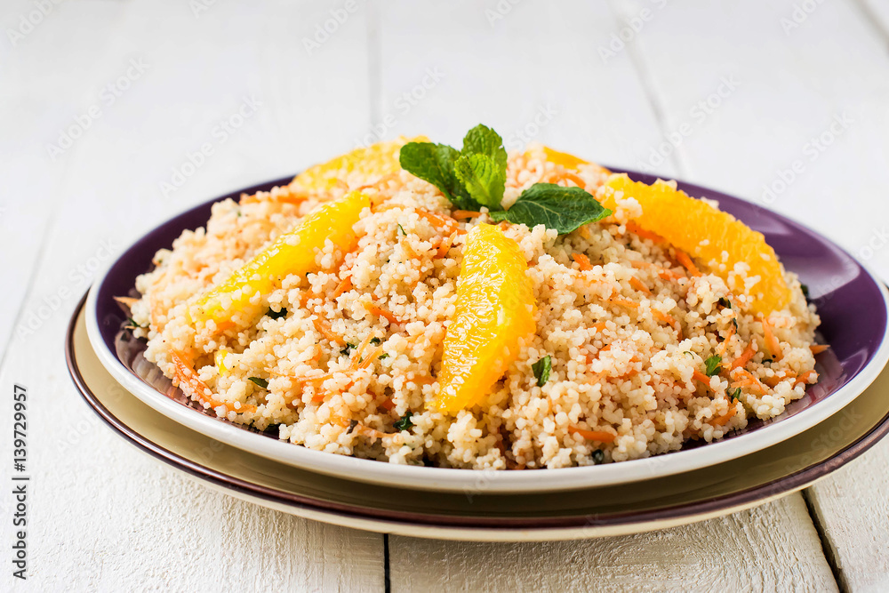 Salad of crumbly couscous with carrots, orange and mint Salad of crumbly couscous with carrots, orange and mint