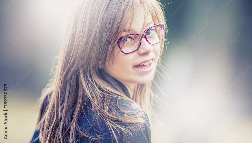 Girl. Teen. Pre teen. Girl with glasses. Girl with teeth braces. Young
