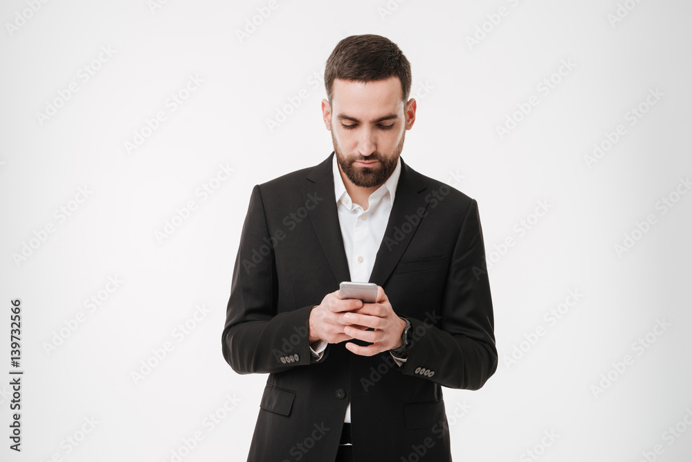 Handsome businessman chatting by mobile phone. Handsome businessman chatting by mobile phone.